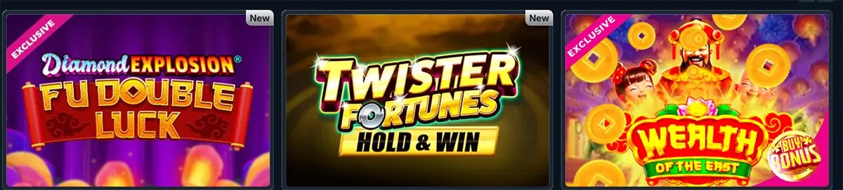 Casino lobby row showing three featured slot tiles: “Diamond Explosion Fu Double Luck” (exclusive), “Twister Fortunes Hold & Win” (new), and “Wealth of the East” (exclusive), displayed as colourful cover art cards.
